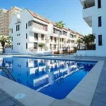 Snug Apartment In Arona With Private Outdoor Pool